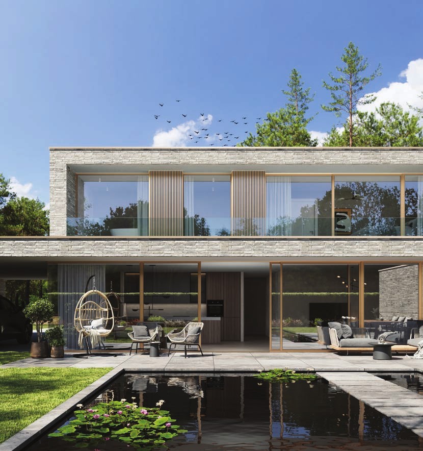 Maison neuve en béton avec grandes baies vitrées